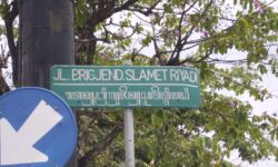 Slamet Riyadi Street Sign with Javanese Slamet Riyadi Street Sign
