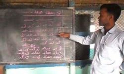 Teaching Hanifi Rohingya. Photo courtesy of Mohammad Noor. Teaching Hanifi Rohingya