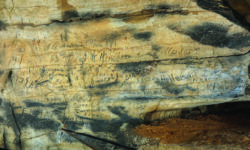Nineteenth-century Cherokee inscriptions found in Manitou Cave near Fort Payne, Alabama. Photo: Alan Cressler. Cherokee cave inscriptions