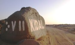 Entrance to Town of Kidal in Tifinagh and English Entrance to Town of Kidal