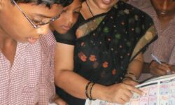 Professor Prasanna Sree with Kupia Script Kupia Script