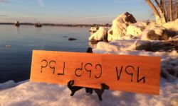 "Mother tongue" in Mru. Carving and photo by Tim Brookes Mru carving