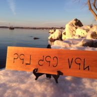 "Mother tongue" in Mru. Carving and photo by Tim Brookes Mru carving