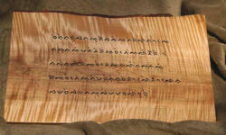 Article One of the Universal Declaration of Human Rights in Lontara. Carving by Tim Brookes. Photo by Glenn Moody Lontara Carving
