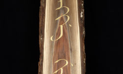 "Mother tongue" in Manchu. Carving by Tim Brookes. Photo by Tom Way. Manchu Carving