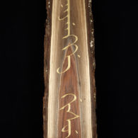 "Mother tongue" in Manchu. Carving by Tim Brookes. Photo by Tom Way. Manchu Carving