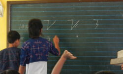 Students learning Hanunuo. Photo courtesy of the Mangyan Heritage Center Students learning Hanunuo