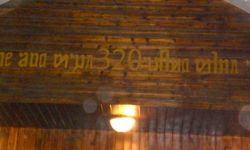 Signage in a Tai Le restaurant. Photo by André Müller. Tai Nuea restaurant