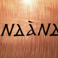 "That which belongs to our home” or “Mother tongue” in Andaandi, carved in the Nubian script. Carving and photo by Tim Brookes. Nubian carving