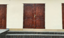 Contemporary Igbo art: carved mahogany doors covered in Nsibidi symbolism and Christian iconography in Aba, Nigeria. Source: Wikipedia Contemporary Igbo art