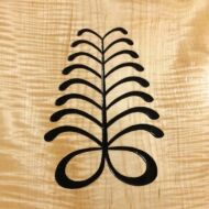 Aya, the fern. As the fern is hardy, flourishing everywhere, so the Aya symbol stands for resilience and resourcefulness. Carving and photo by Tim Brookes. Aya carving